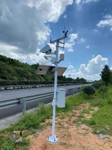 Optical visibility sensor used for monitoring atmospheric visibility near a road